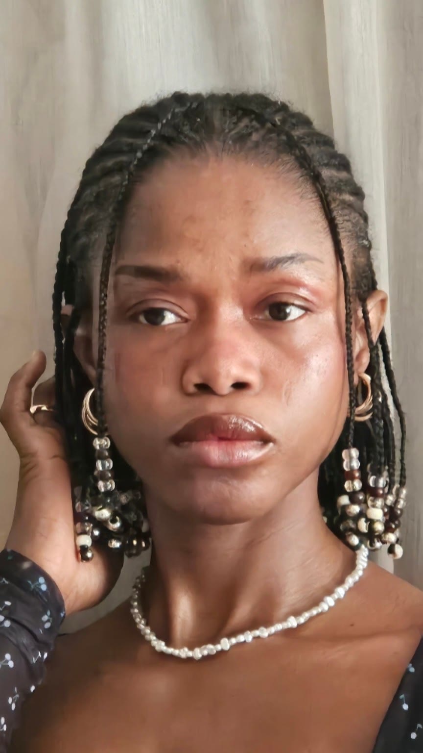 Fulani courtes perlées réalisées par Izzy